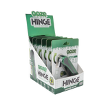Display box of ooze Hinge batteries with green and white design.