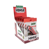 Display box of Ooze Hinge vape battery with red and white design.